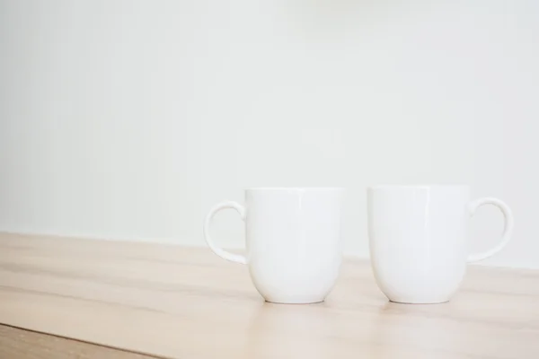 White coffee cup on table