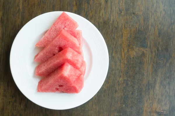 Watermelon fruit in white plate — Stock Photo, Image