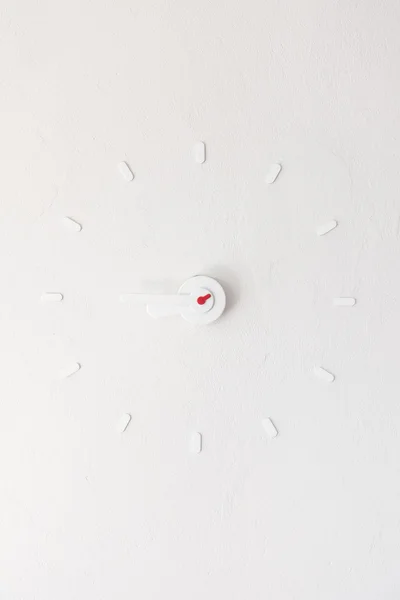 Clock on white wall — Stock Photo, Image