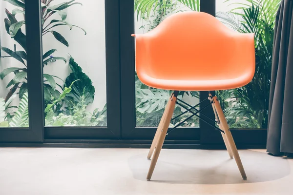 Orange chair in living room