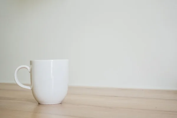 Coffee cup on table