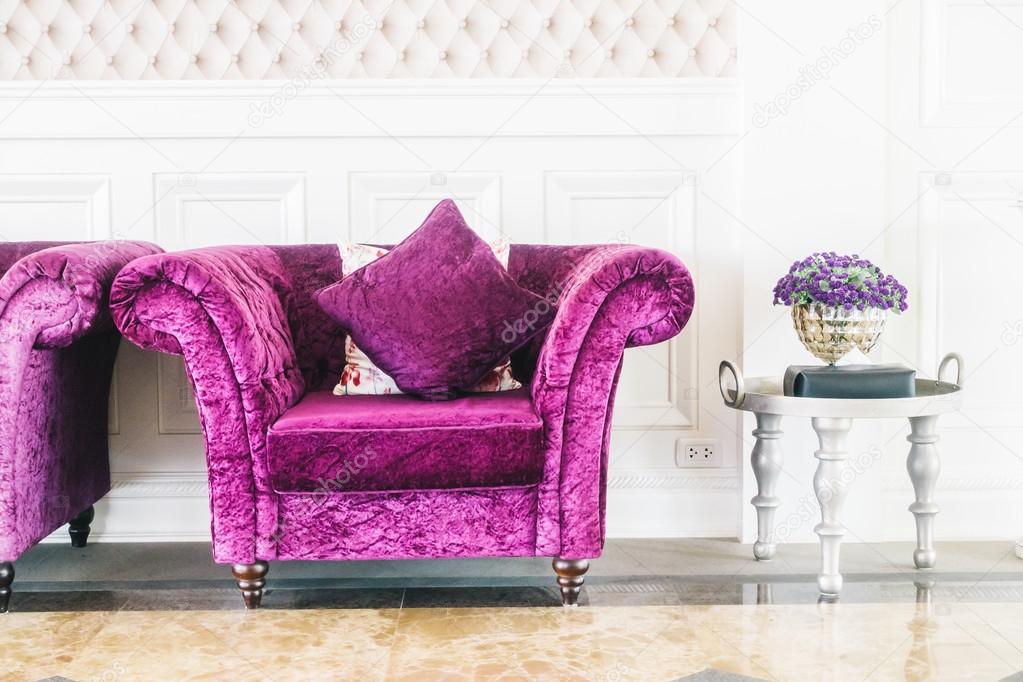 Purple sofas with pillow