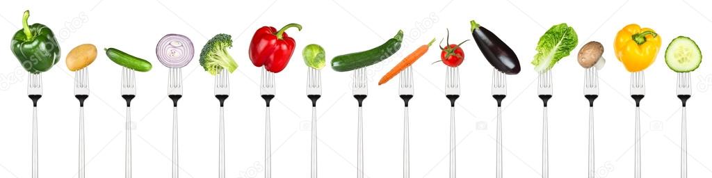 set of tasty vegetables on forks
