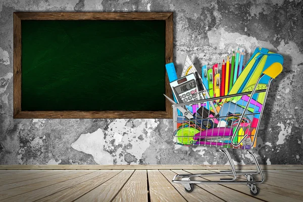 Office / school supplies in shopping cart — Stock Photo, Image