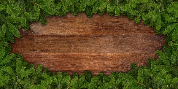 Fir takken frame op hout — Stockfoto