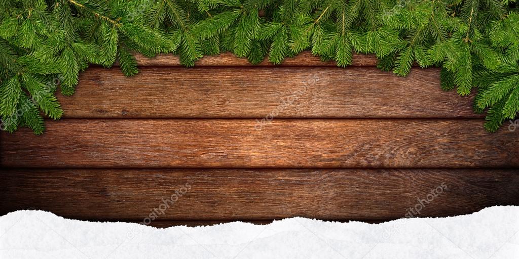 fir branches frame on wood