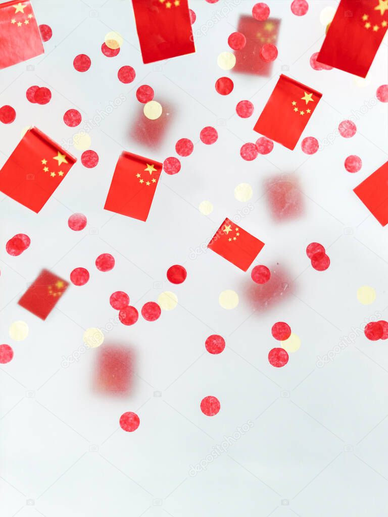 Day Formation Peoples Republic China. October 1. National holiday, concept freedom, patriotism and memory. Flags foggy background. Defocusing