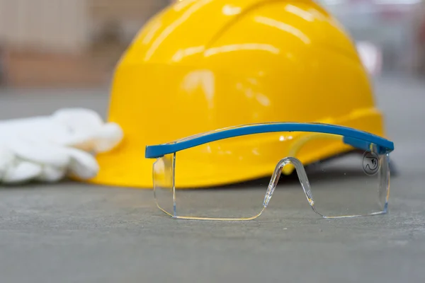 Glasses and helmet for head protection — Stock Photo, Image