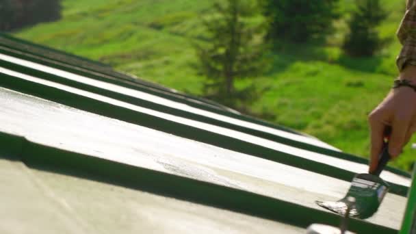 Man Repairing Cabin Roof — Stock Footage Man Repairing Cabin Roof Stock Footage