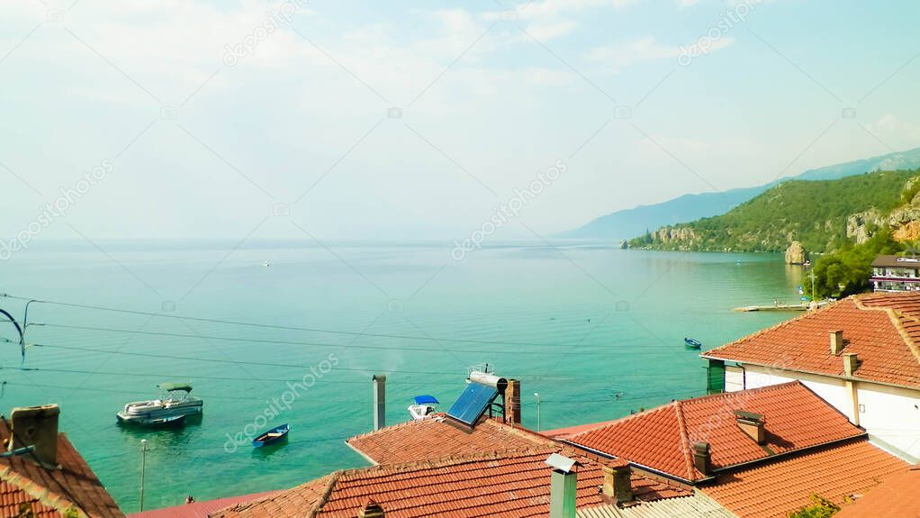 Water of lake Ochrid, Trpejca, Macedonia. Ochrid Lake is the oldest lake in Europe, known of it's clean, transparent water. Vacations and tourism concept.