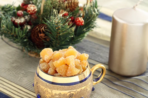 Candied ginger in Christmas atmosphere — Stock Photo, Image