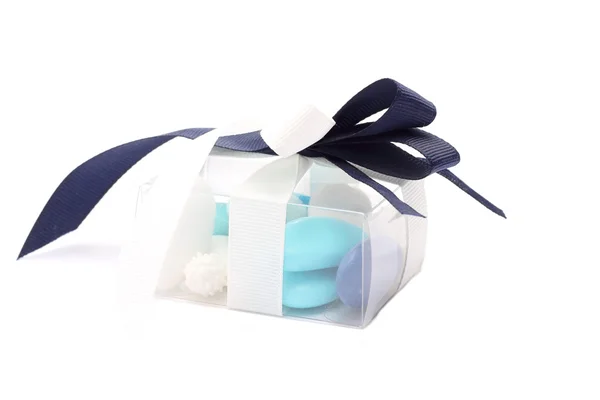 Blue and white sugared almonds in transparent plastic box — Stock Photo, Image