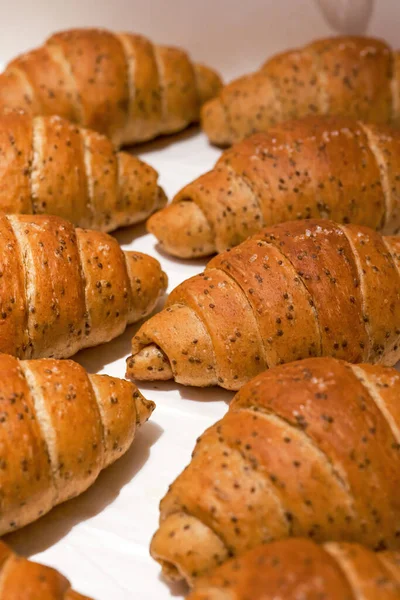 Close-up of a whole roasting pan of French croissant