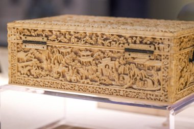 Close-up of a carved ivory storage box in Lingnan style, Guangdong, China