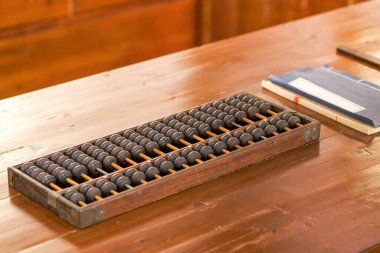 Chinese traditional counter abacus and bookkeeping book, shopkeeper