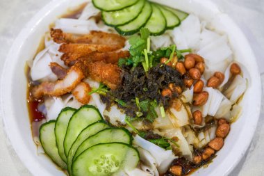 A delicious Chinese Guangxi dish, crispy pork soy sauce rice noodles, rice noodles