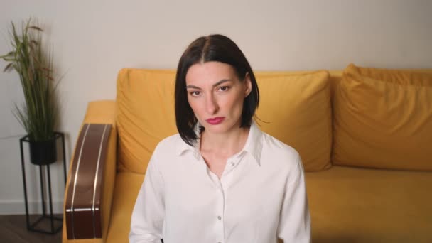 Portrait of upset young attractive businesswoman looking at camera, sad serious beautiful woman crying at home office closeup slow motion — Stock Video