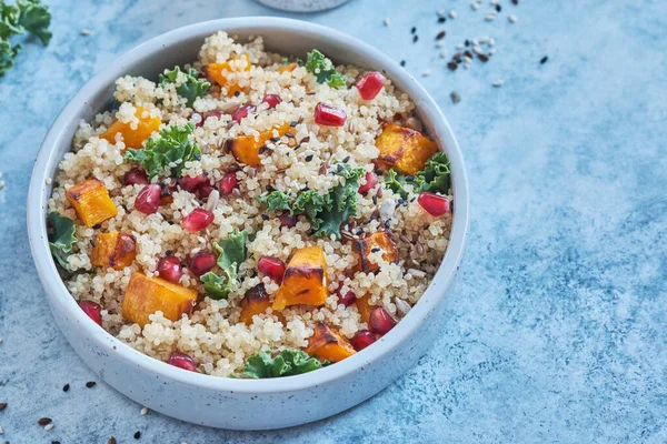 Kale, Butternut Squash, Pomegranate and Quinoa Salad — стокове фото