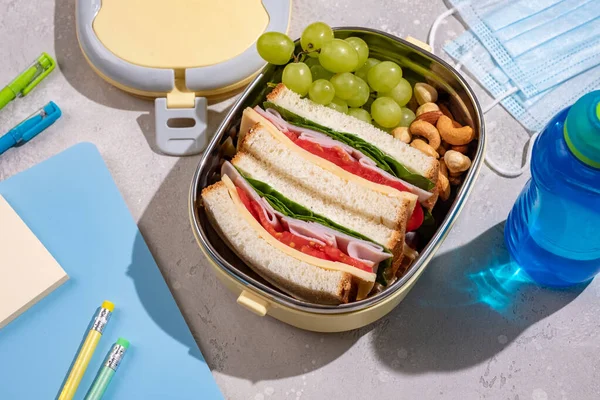 Healthy lunch box with sandwich — Stock Photo, Image