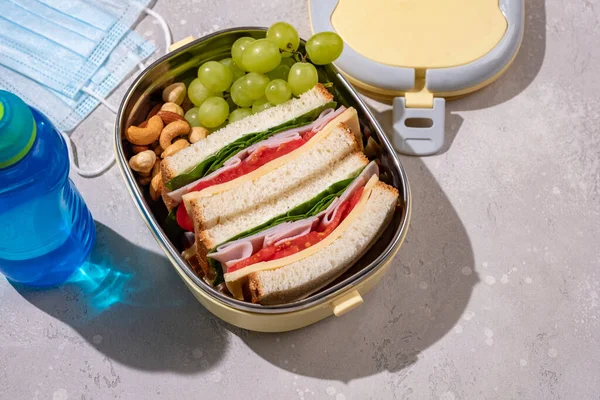 Healthy lunch box with sandwich — Stock Photo, Image