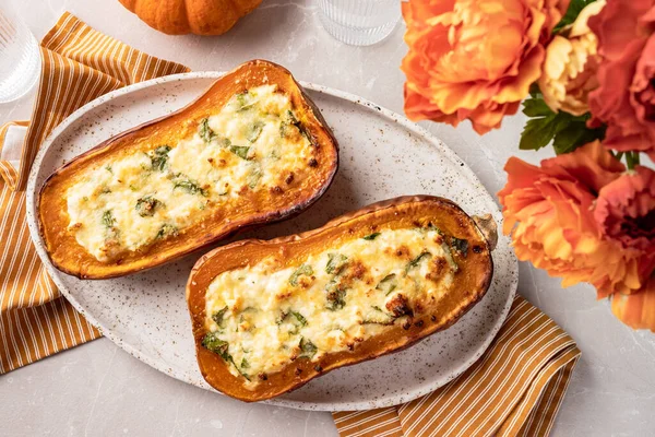 Baked Butternut Squash Stuffed with Spinach and cheese
