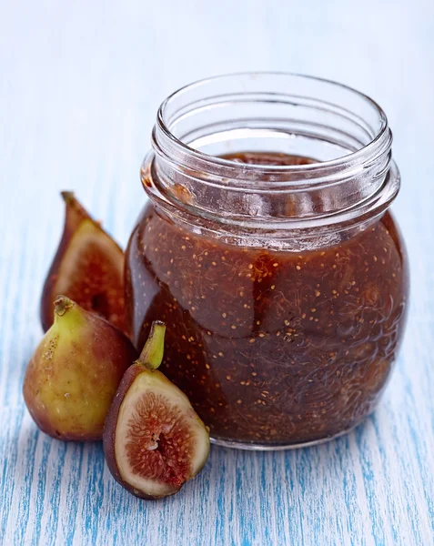 Fig jam in a glass jar with fresh figs — Stock Photo, Image