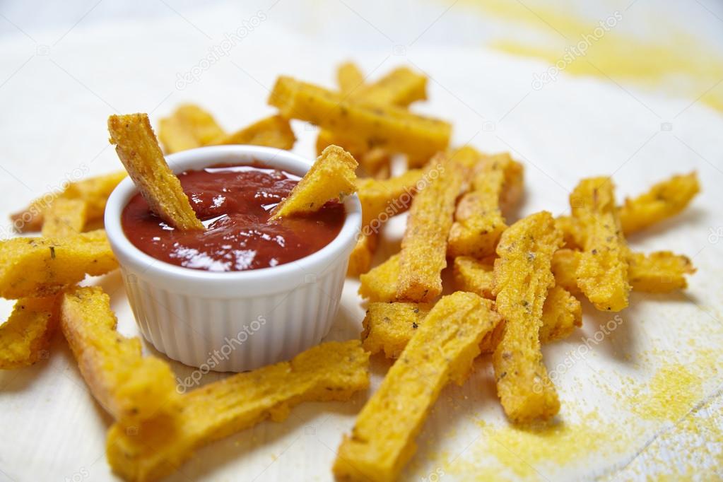 Polenta fries with tomato sauce