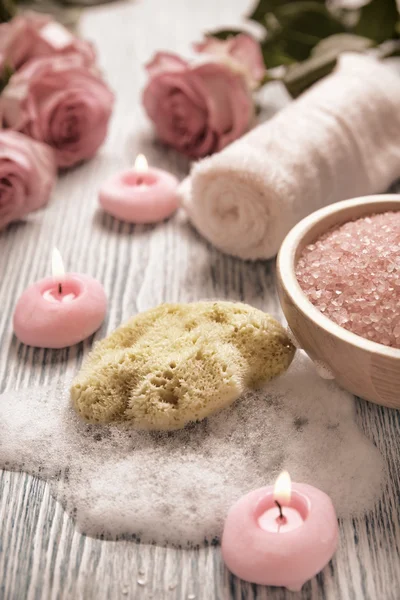 Close-up of candles and flowers — Stock Photo, Image