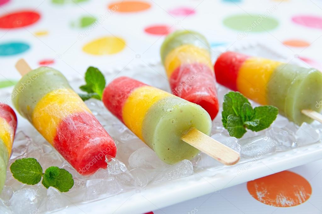 Homemade pureed fresh fruit popsicles Stock Photo by ©Odelinde 63432617
