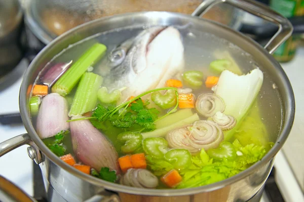 Cooking  fish broth with vegetables — Stock Photo, Image