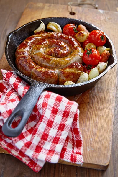 Roasted sausage with vegetables — Stock Photo, Image