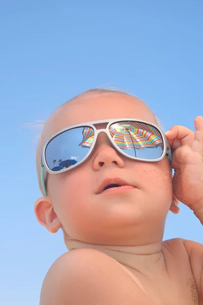 Baby boy with sunglasses Stock Image