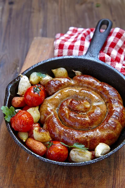 Roasted sausage with vegetables — Stock Photo, Image