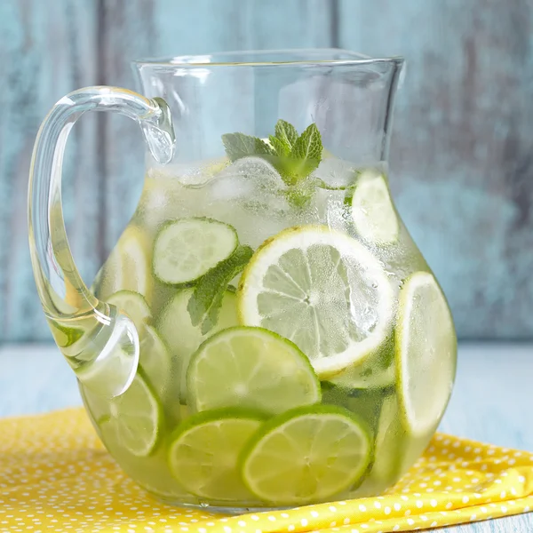 Fruit water in glass pitcher