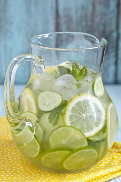 Fruit water in glass pitcher — Stock Photo, Image