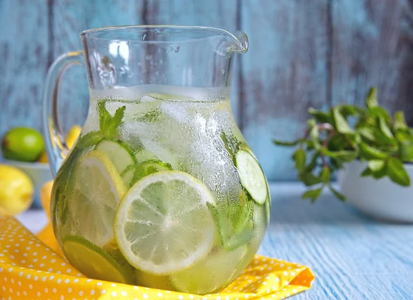 Fruit water in glass pitcher — Stock Photo, Image