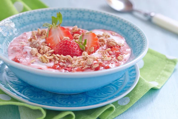 Yogurt with strawberry and granola — Stock Photo, Image