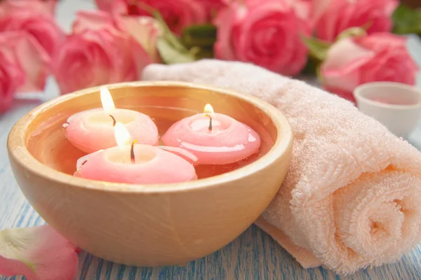 Close-up of candles and flowers — Stock Photo, Image