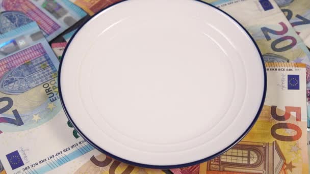 Medical Surgical Mask Falls Empty Plate Table Covered Euro Money — Stock Video