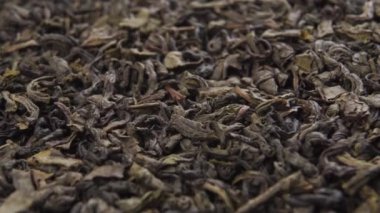 Kurutulmuş bitki çayı yaprakları. Makro. Doli Vuruşu