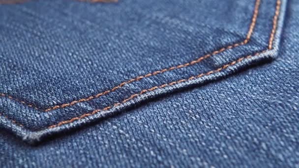 Tasca Jeans Denim Cotone Indaco Con Fili Arancioni Macro Sparato — Video Stock