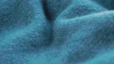 Soyut mavi yün örgü süveter dalgaları. Makro. Doli Vuruşu