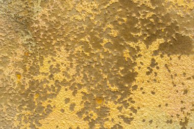 Yıpranmış çimento, sarı duvar dokusu. Soyut arkaplan