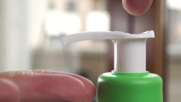 Man Push Dispenser Antibacterial Liquid Soap Squeezes Disinfect His Hands — Stock Video