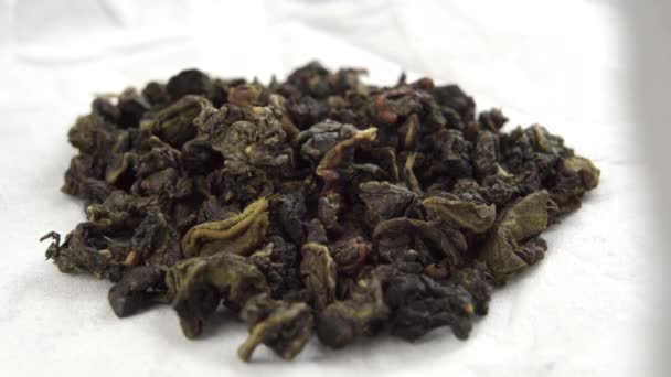 Dried Fermented Gunpowder Green Tea Leaves White Paper Wrapper Close — Stock Video