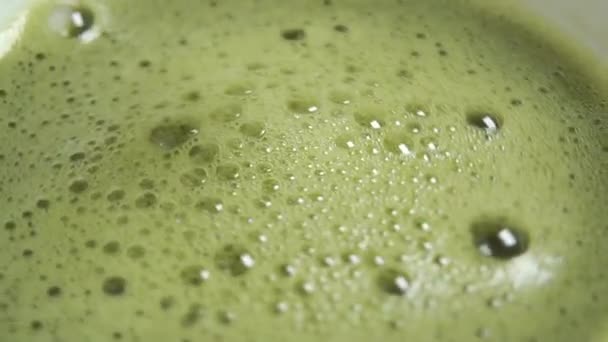 Frothed Matcha Green Tea Froth Rotates Bubbles Macro Shot Freshly — Stock Video