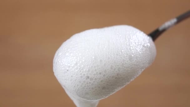 Whipped White Thick Milk Foam Falls Metal Coffee Spoon Close — Stock Video