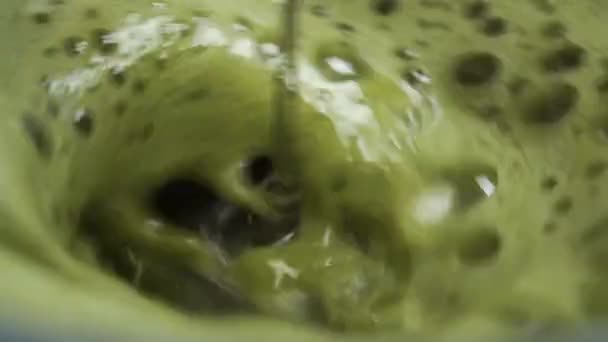 Frothing Foam Green Matcha Tea Slow Motion Close Electric Whisk — Stock Video
