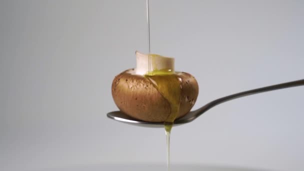 Vegetable Oil Poured Raw Champignon Mushroom Splashes Slow Motion White — Stock Video