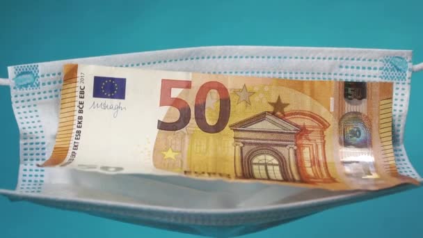 Les Billets Euros Tombent Dans Masque Médical Protecteur Sur Fond — Video